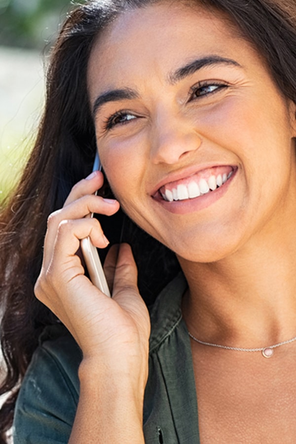 Smiling Teen with Phone